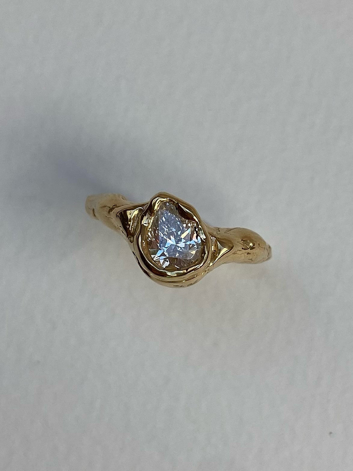 chunky Pear diamond engagement ring