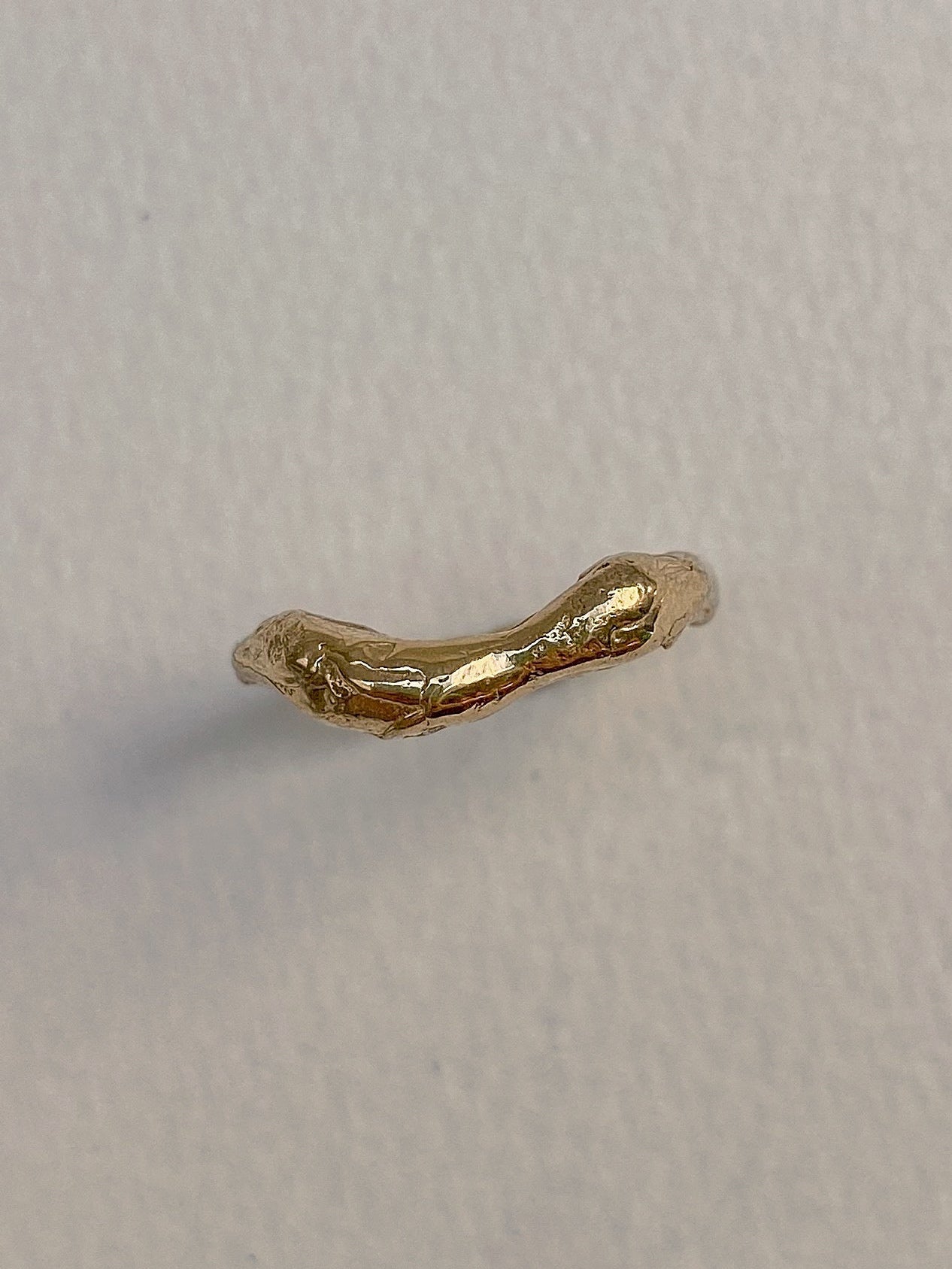 Wavy chunky organic wedding ring in 18 karat yellow gold
