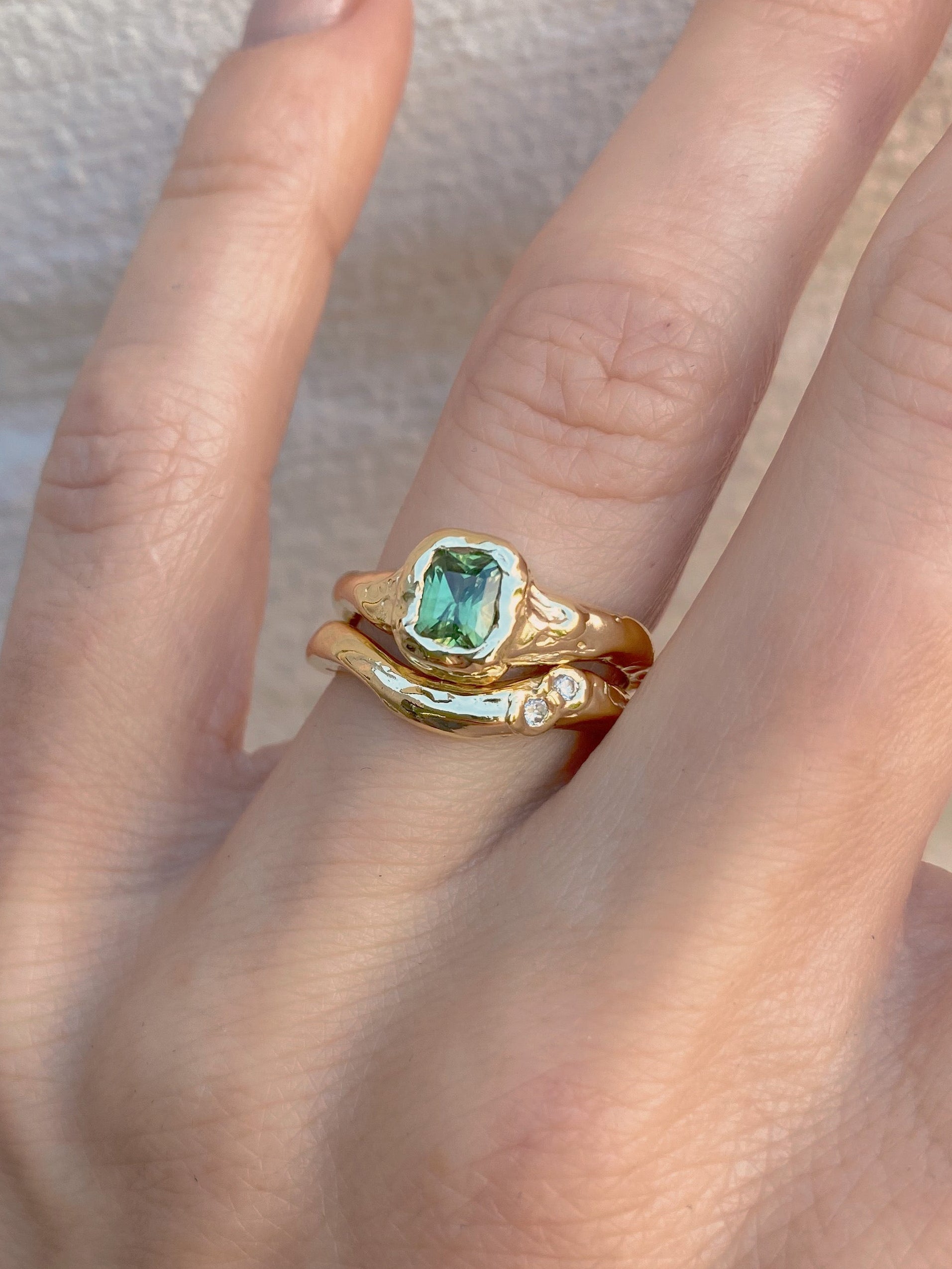 Chunky wavy wedding ring with diamonds in organic setting