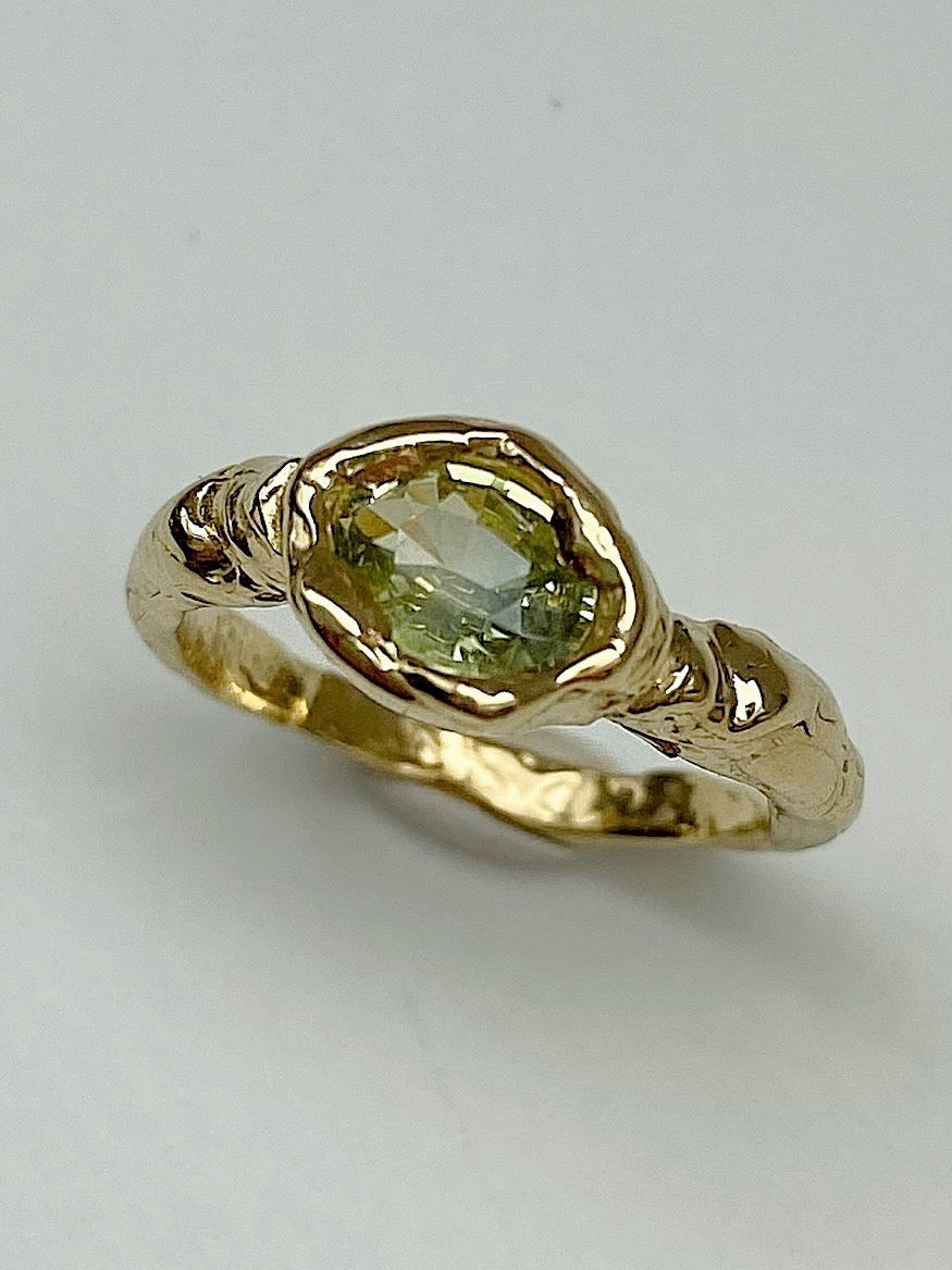 Cool chunky organic engagement ring with oval yellow green diamond