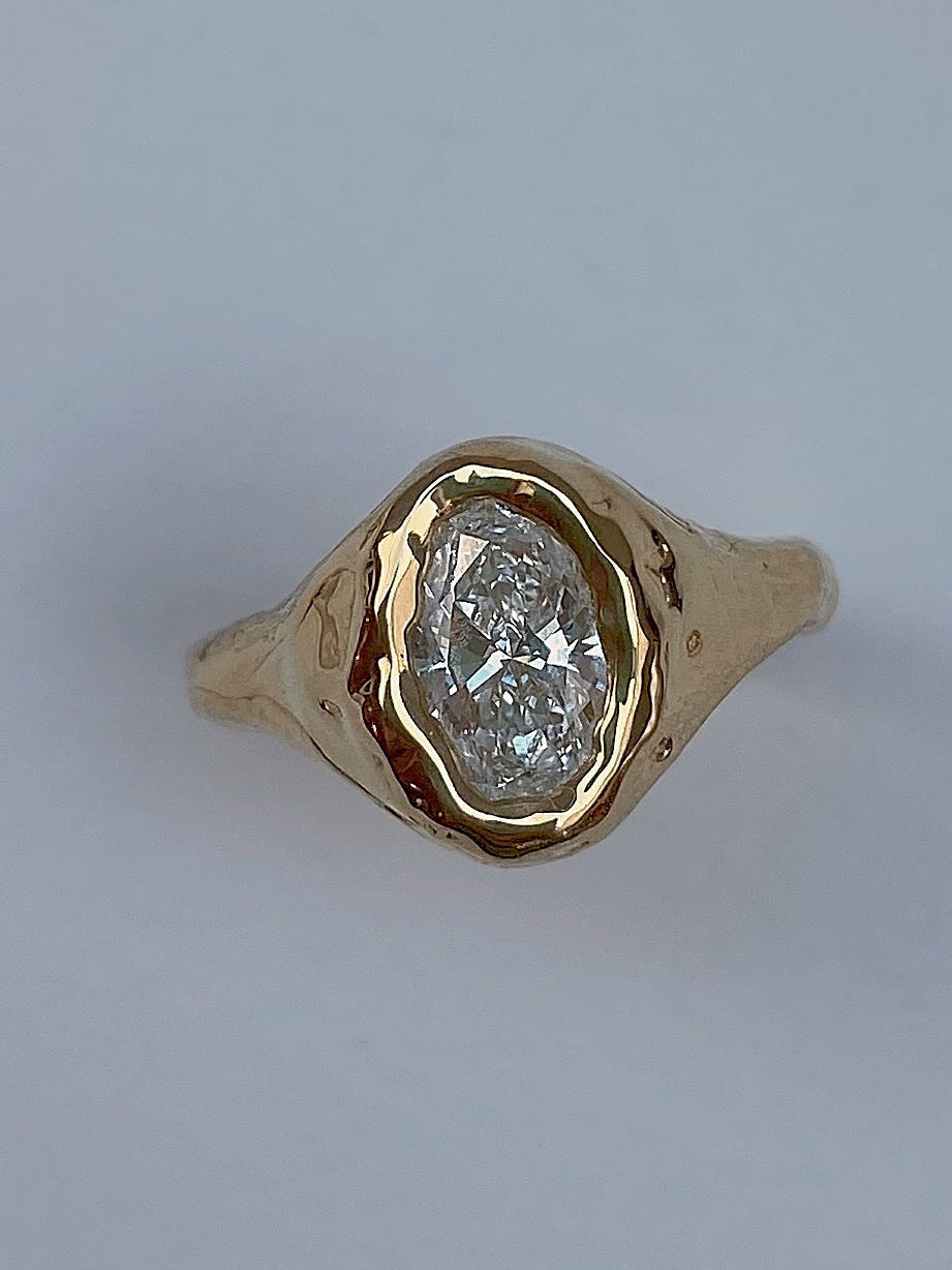 1 carat Oval diamond organic setting engagement ring in 18 karat gold