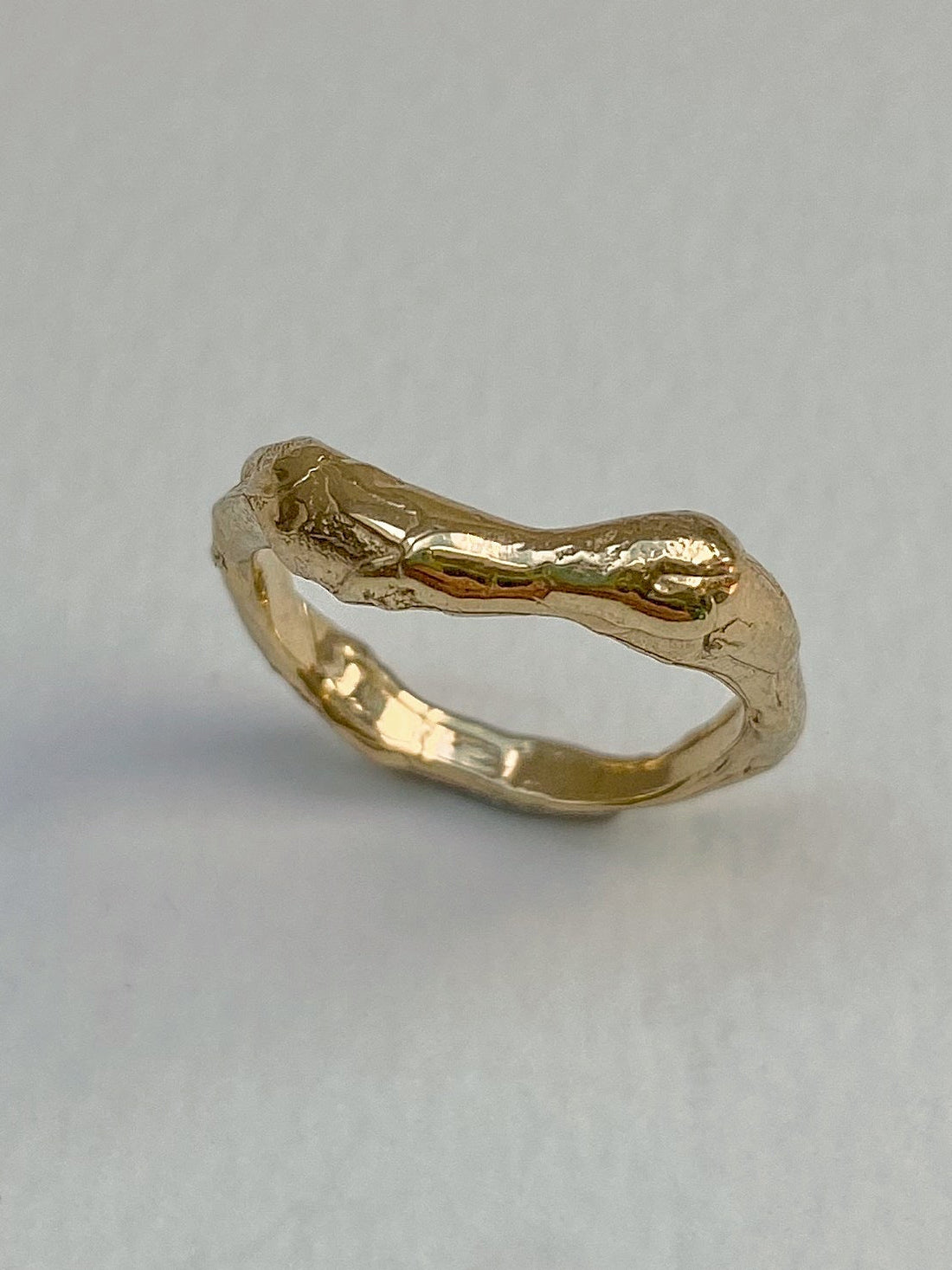 Wavy chunky organic wedding ring in 18 karat yellow gold