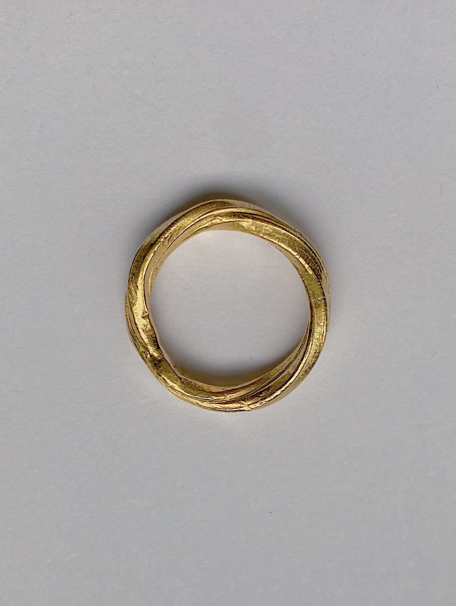 gevlochten gouden trouwring