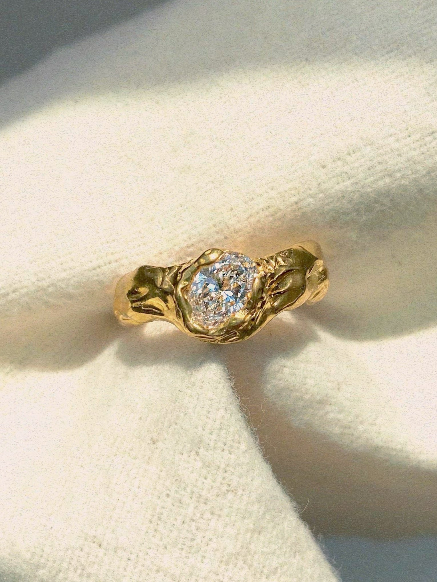 big chunky engagement ring with oval diamond