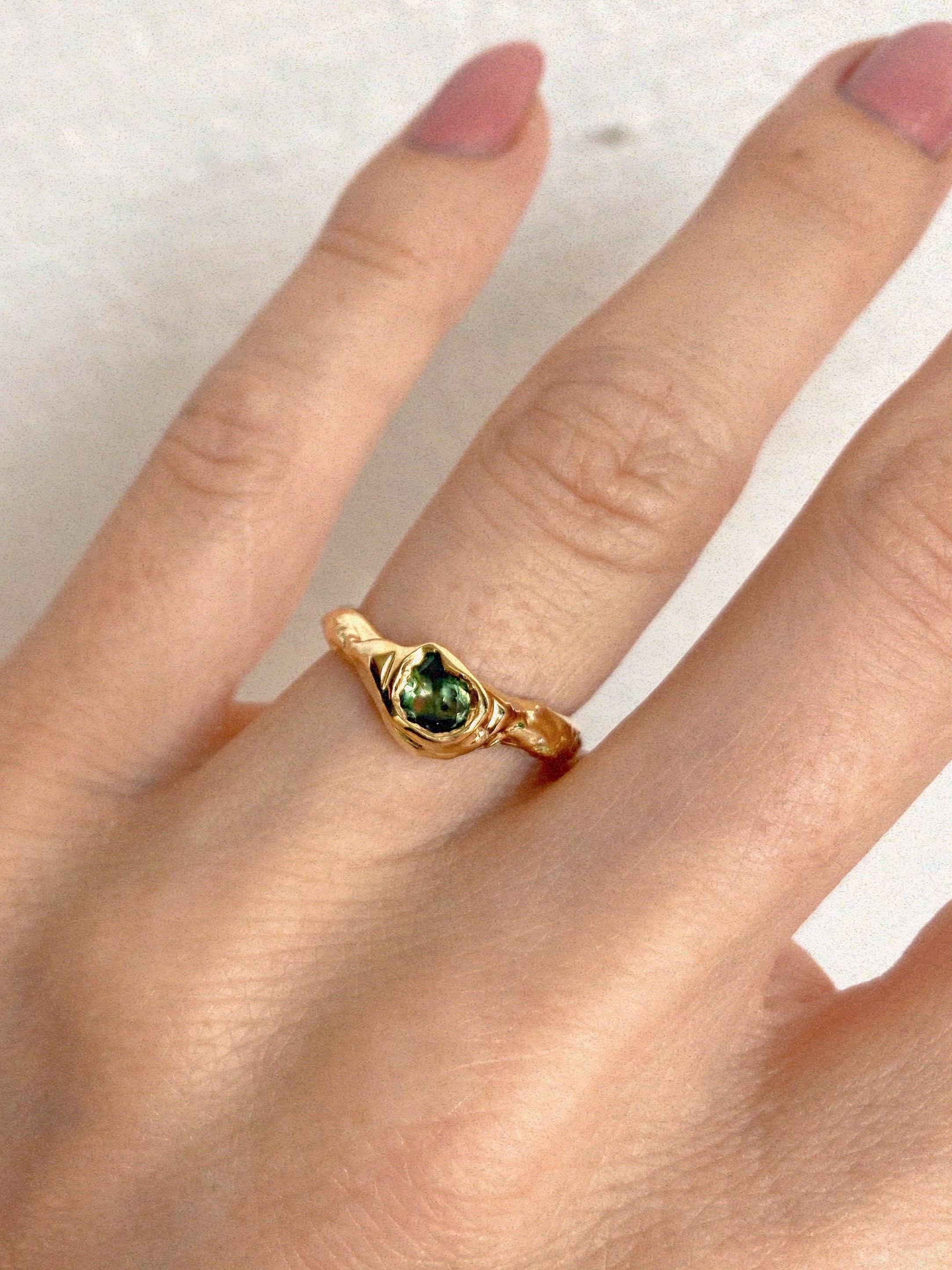 green pear sapphire engagement ring