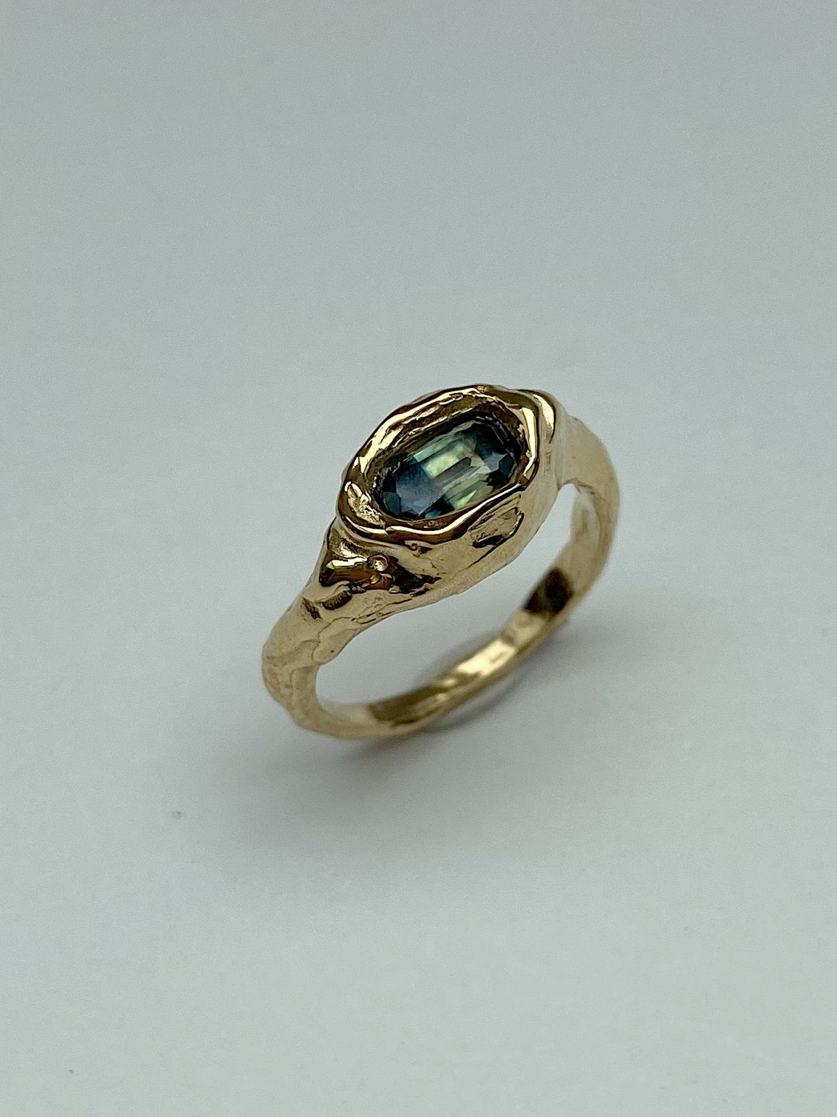 Chunky engagement ring green sapphire
