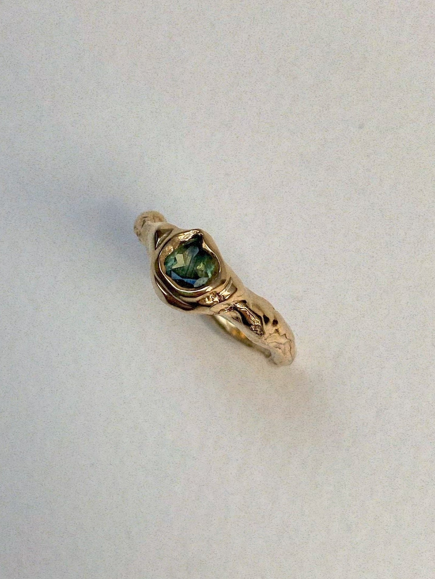 green sapphire engagement ring