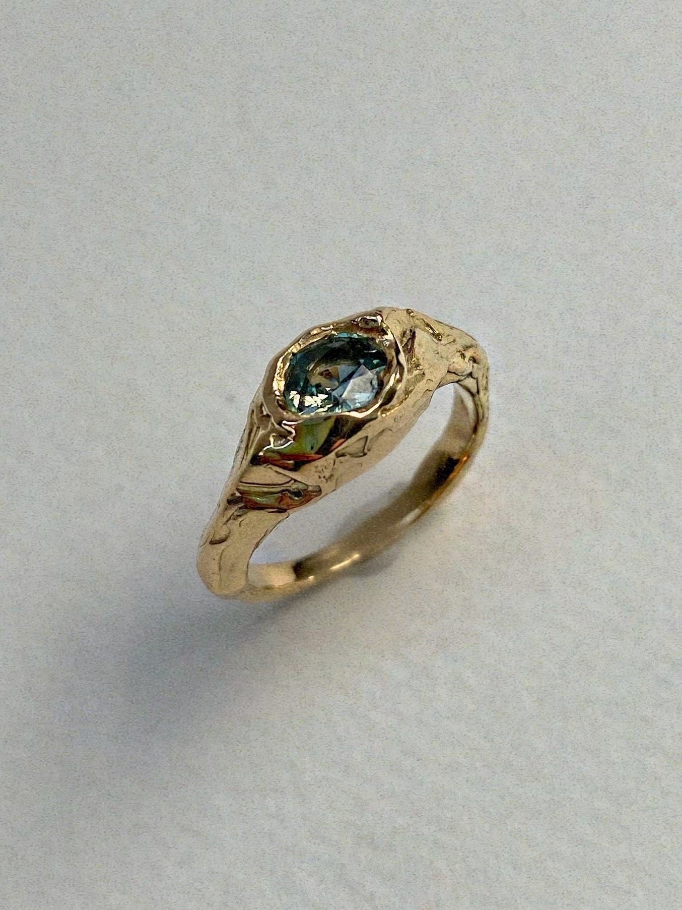 blue green sapphire engagement ring