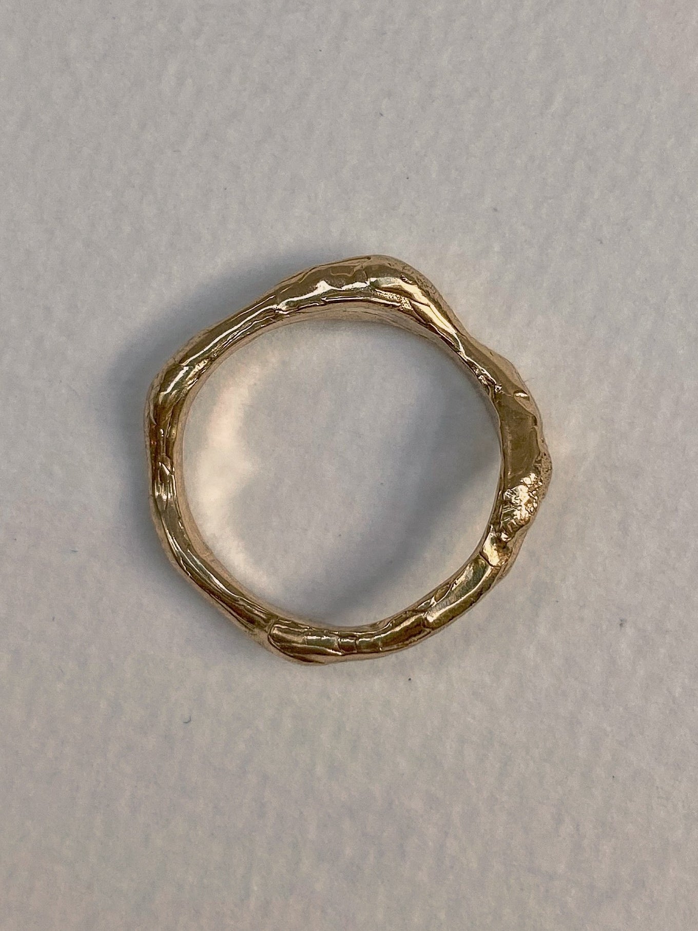 Wavy chunky organic wedding ring in 18 karat yellow gold