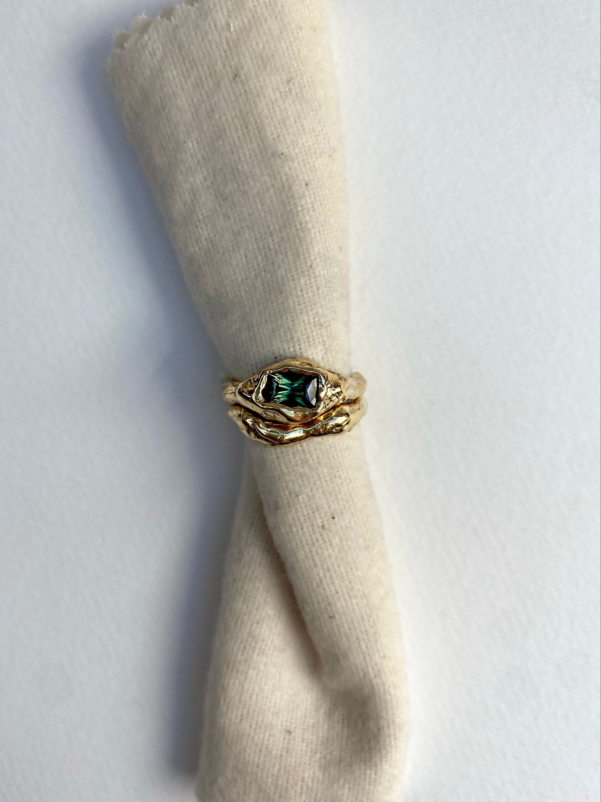 organic engagement ring green sapphire
