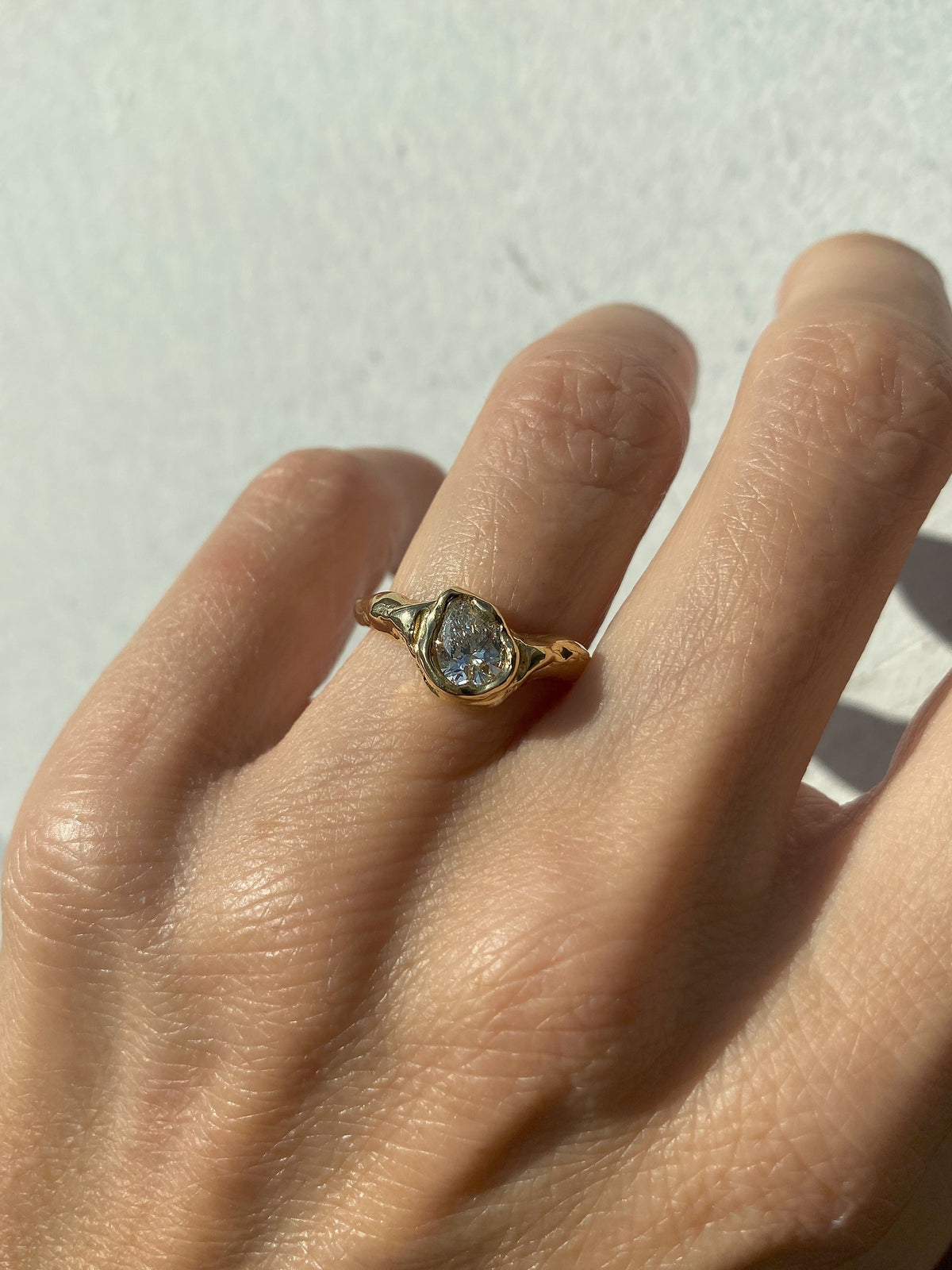 chunky Pear diamond engagement ring
