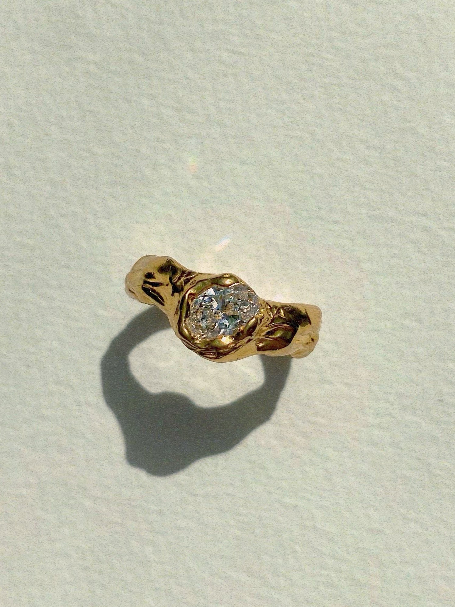 big chunky engagement ring with oval diamond