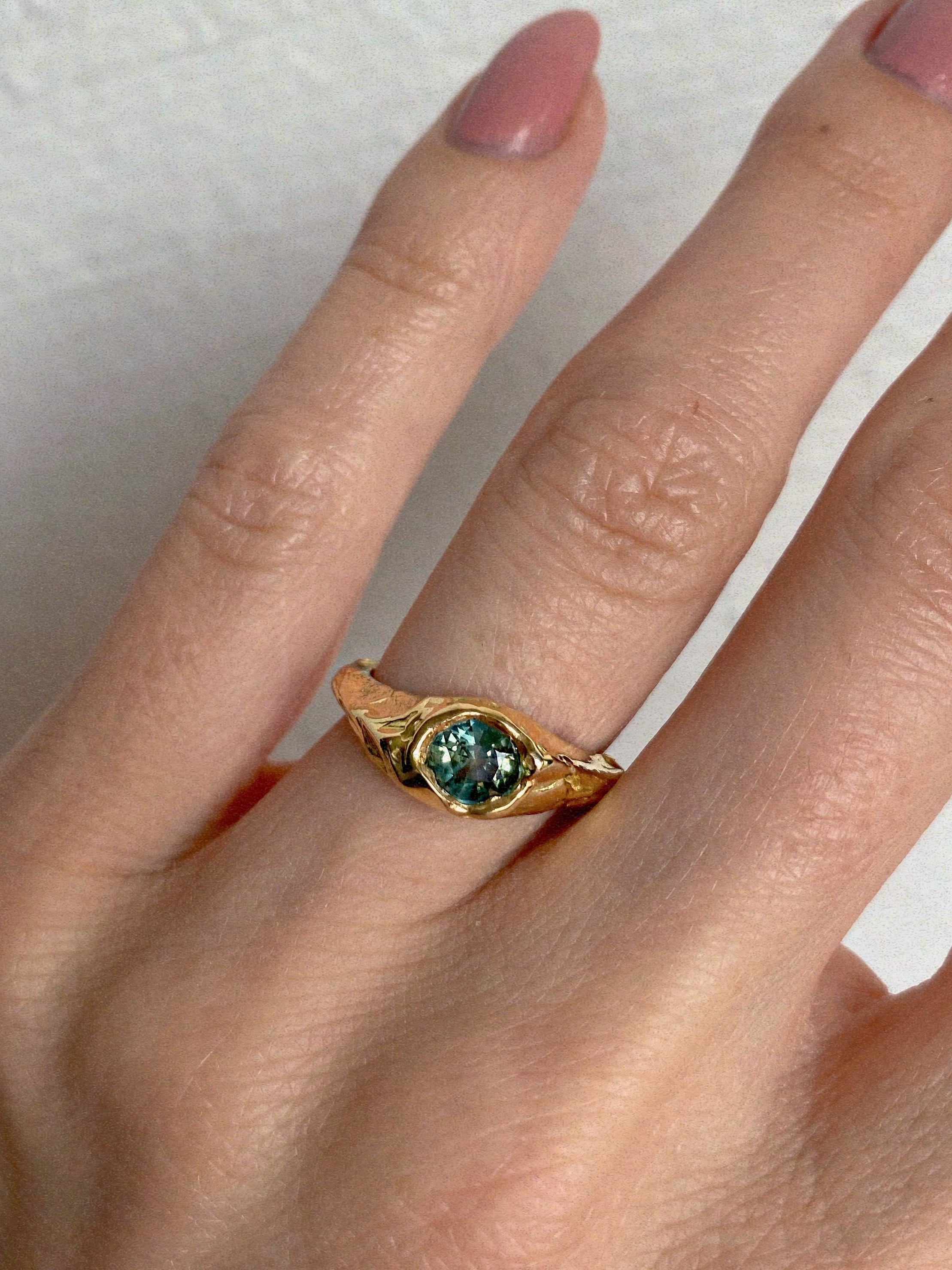 green sapphire engagement ring