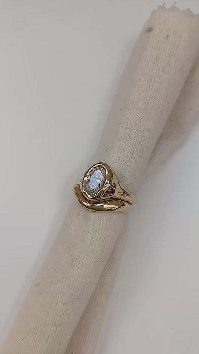 Wavy chunky wedding ring to pair with engagement ring