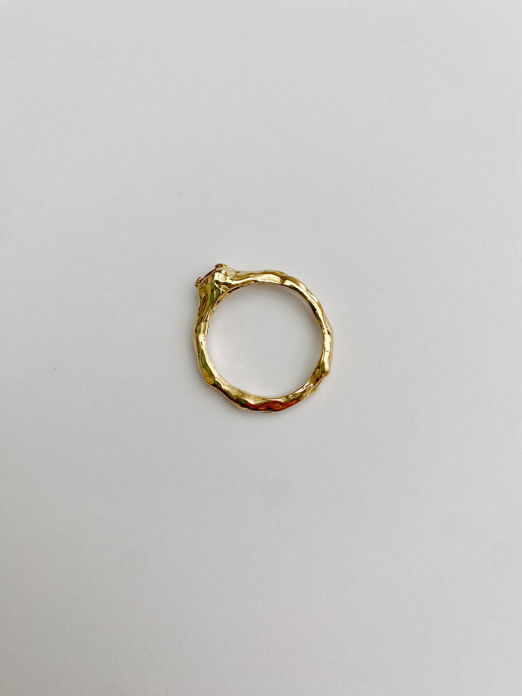 18k gold ring with pink/orange sapphire